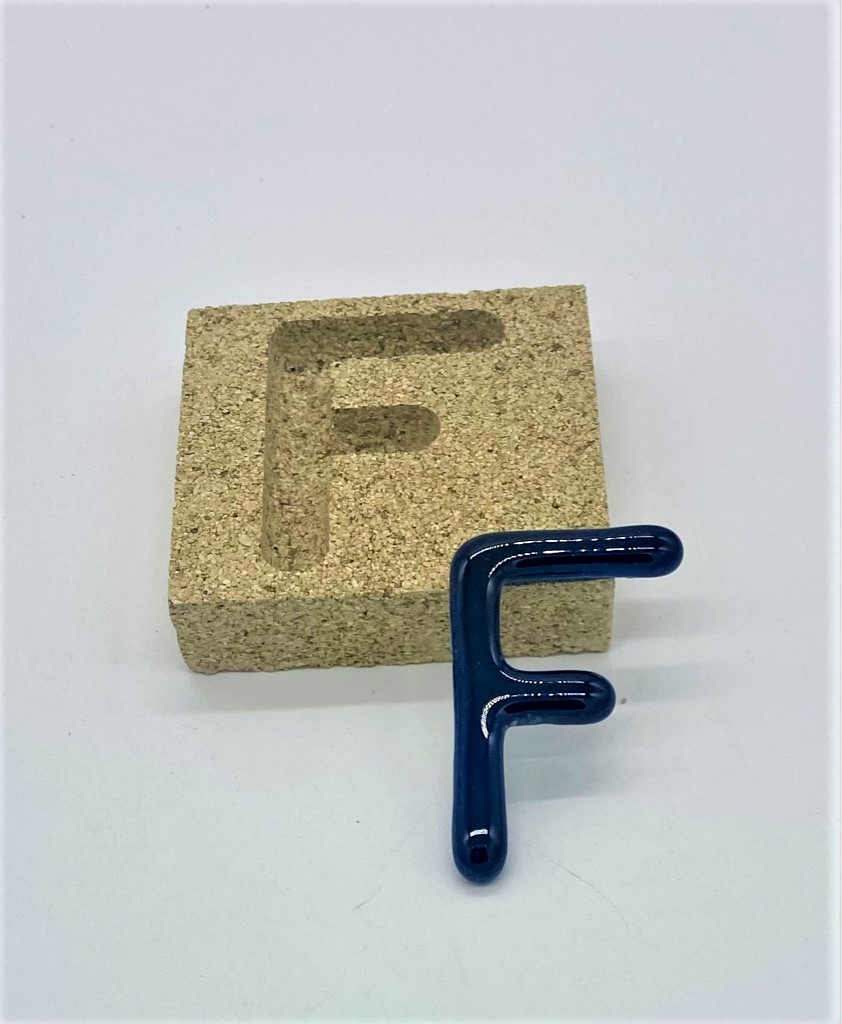 Form aus Vermiculite Buchstabe F