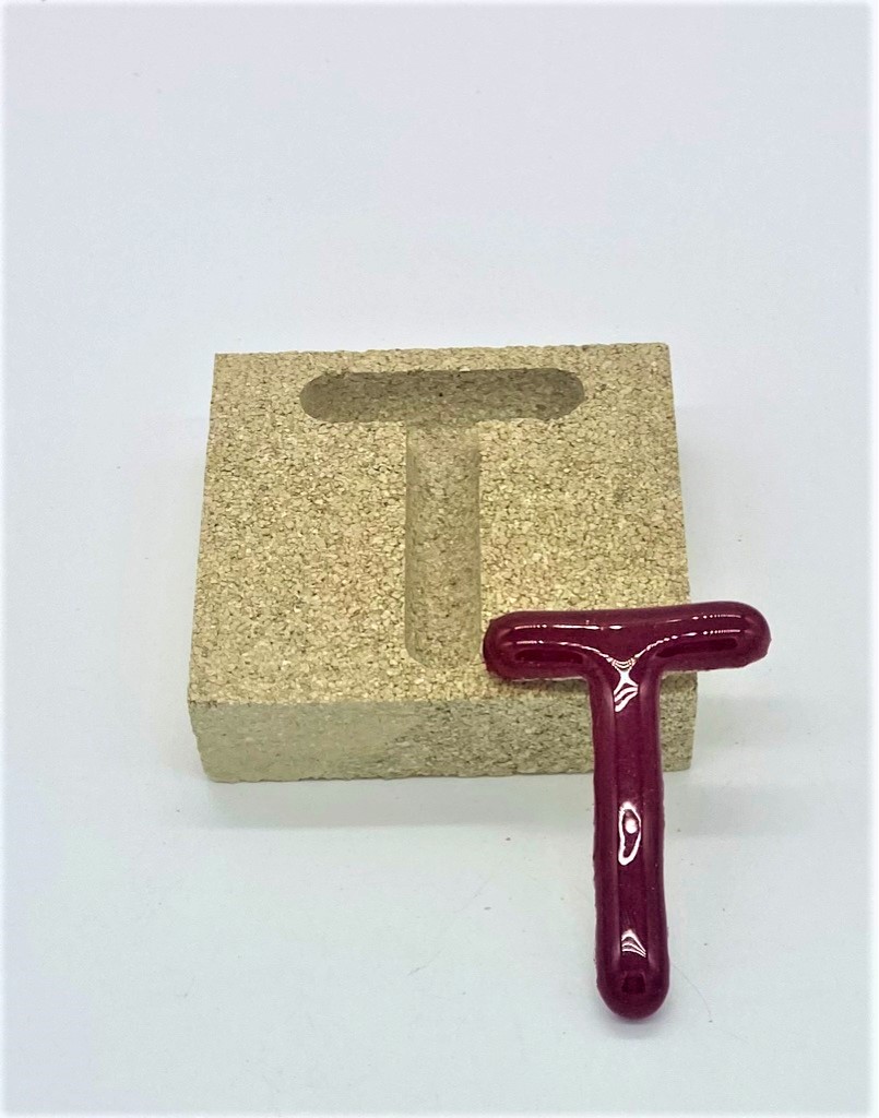 Form aus Vermiculite Buchstabe T