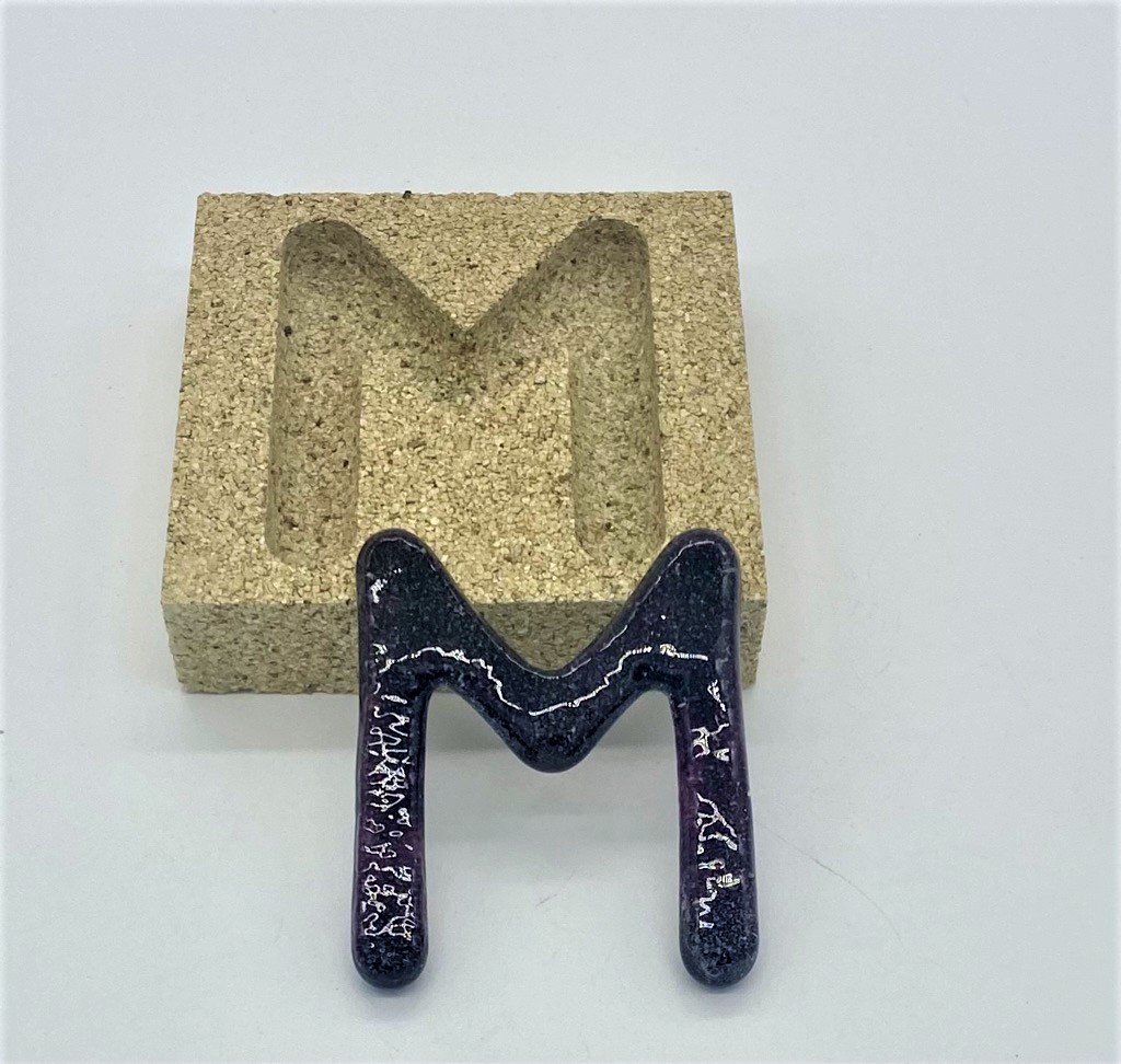 Form aus Vermiculite Buchstabe M