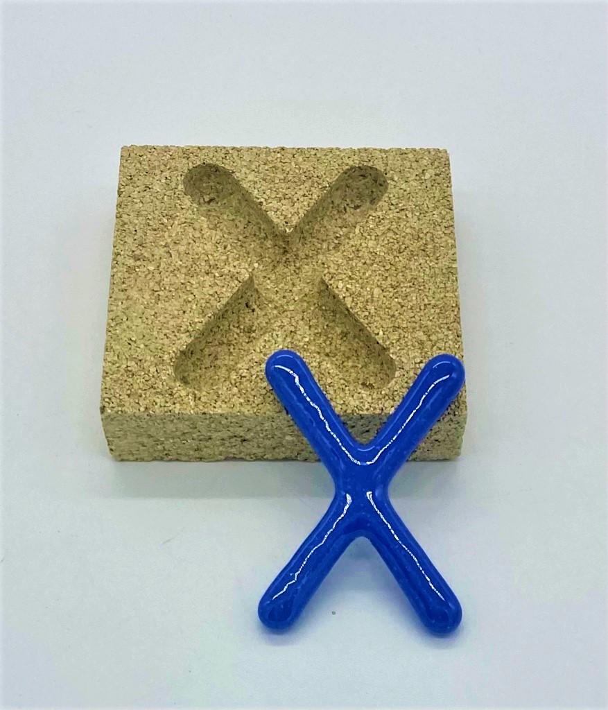 Form aus Vermiculite Buchstabe X